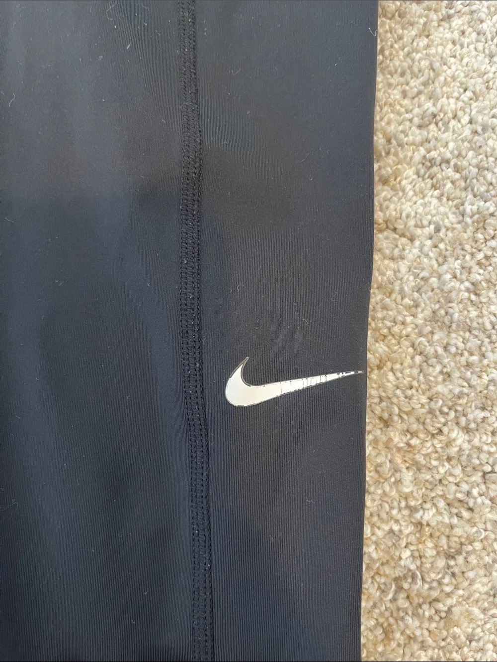 Nike Black Leggings with White Swoosh Accent
